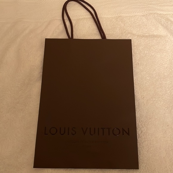 Louis Vuitton authentic gift bag measures approx. 8x 11 inches. Never opened. - Picture 2 of 6